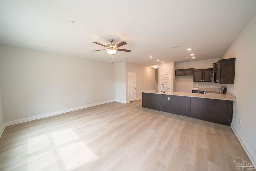 Representative unfurnished interior of a home built from the Plan 1767 Townhome by Adams Homes in Lexlee Estates, Pensacola (Image 9). Representative unfurnished interior of a home built from the Plan 1767 Townhome by Adams Homes in Lexlee Estates, Pensacola (Image 9).