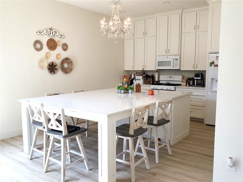 Large Granite Island with Kitchen Chandelier