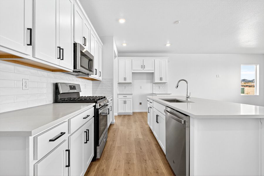 Furnished interior view inside a new home in Trailstone, Arvada (Image 7).