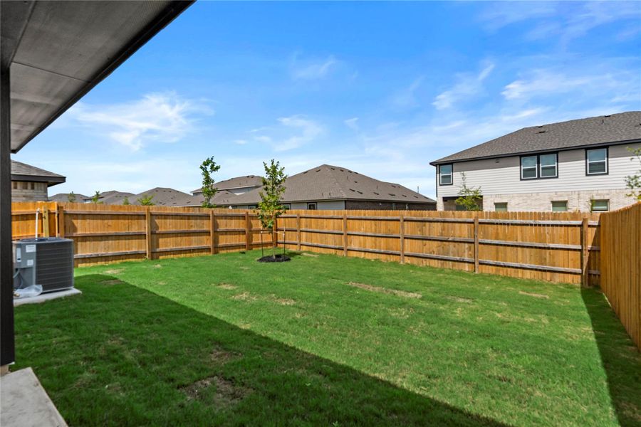 Exterior details and patio area of a home in Palomino, Manor (Image 3).
