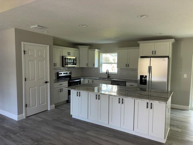 Furnished interior view inside a new home in , Dunnellon (Image 10).