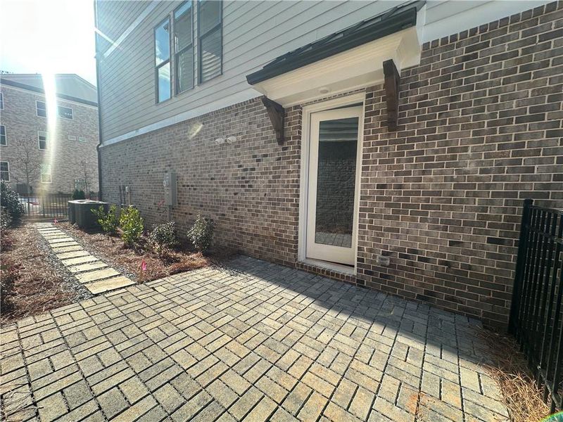 Exterior details and patio area of a home in Waterside Single Family, Peachtree Corners (Image 26).