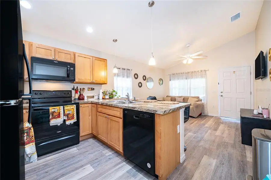 Furnished interior view inside a new home in , Tavares (Image 6).