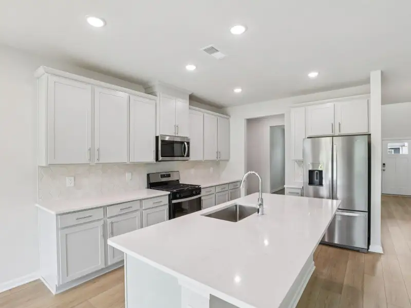 Furnished interior view inside a new home in River Glen, Angier (Image 3).