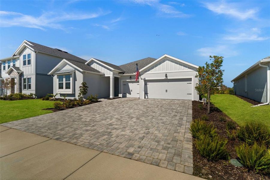 Front exterior of a new home in , Punta Gorda, FL, highlighting curb appeal (Image 2).