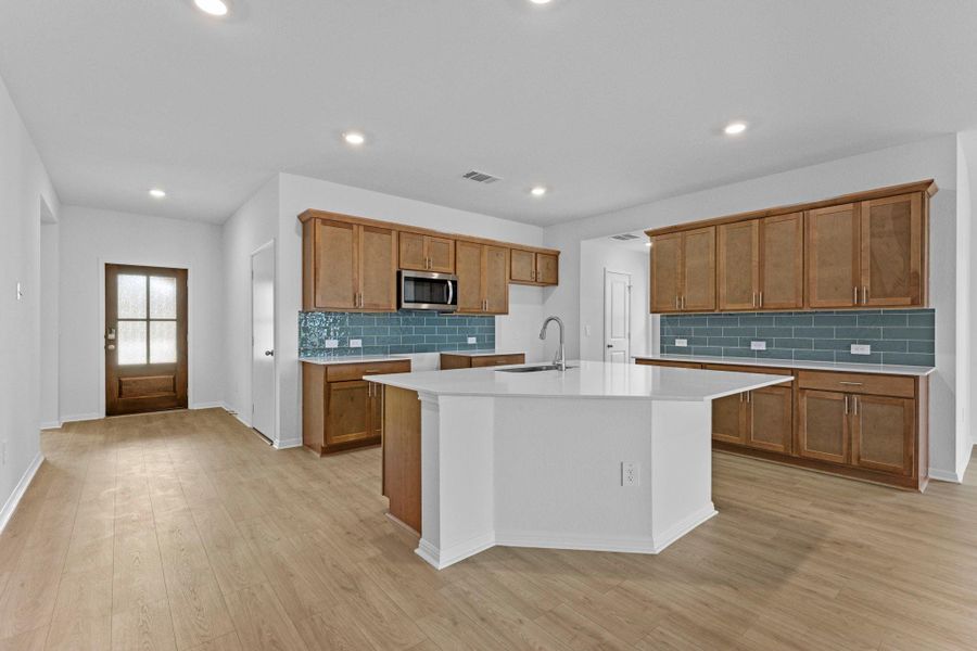 Furnished interior view inside a new home in Bar W Ranch, Leander (Image 13).
