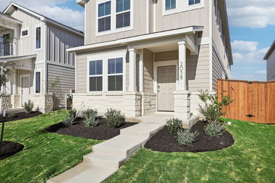 A house with a front yard.