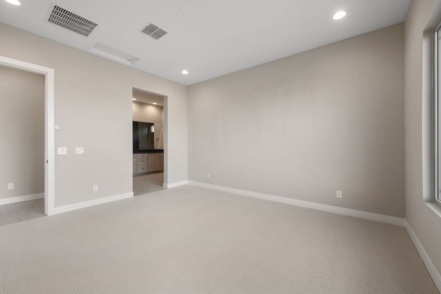 Spacious, unfurnished interior of a new home in Legado West, Queen Creek (Image 31).