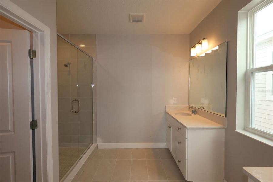 Furnished interior view inside a new home in Lake Star at Ovation, Winter Garden (Image 6).