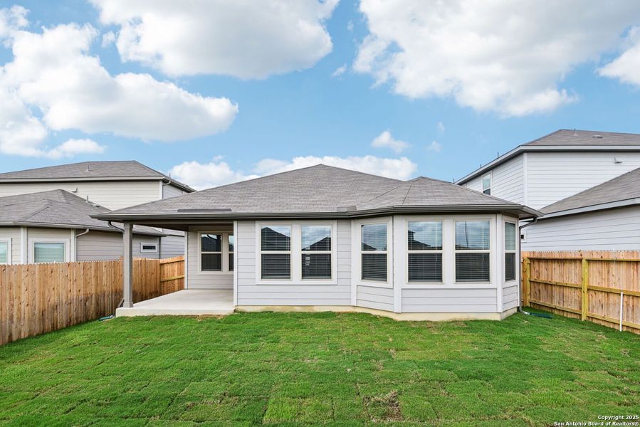 Front exterior of a new home in Legendary Trails - Premier Series, Cibolo, TX, highlighting curb appeal (Image 1). Front exterior of a new home in Legendary Trails - Premier Series, Cibolo, TX, highlighting curb appeal (Image 1).