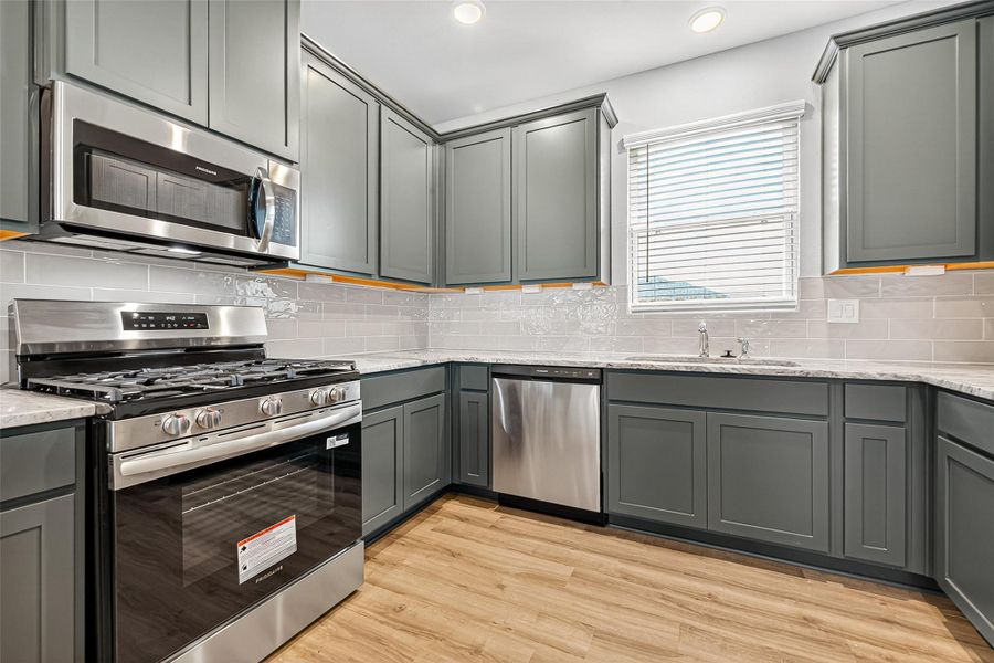 Furnished interior view inside a new home in Sunterra, Katy (Image 6).