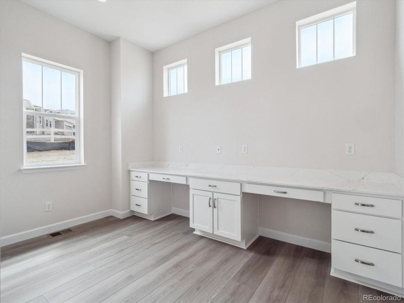 Furnished interior view inside a new home in Vista Pines at Crystal Valley, Castle Rock (Image 15).
