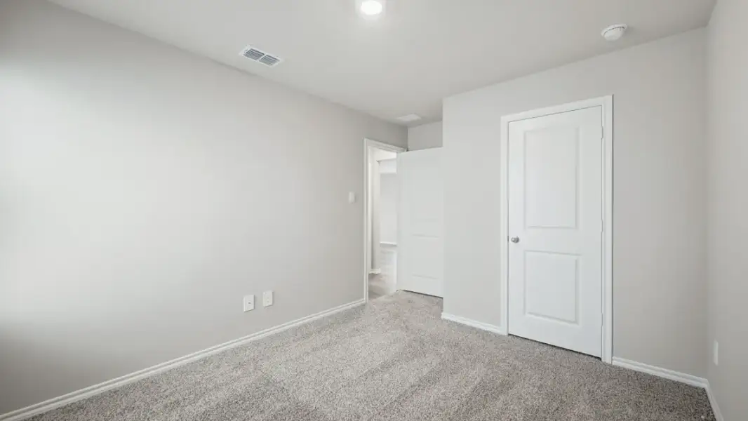 Representative unfurnished interior of a home built from the Caprock by D.R. Horton in Blackbird Estates, Mineral Wells (Image 34).