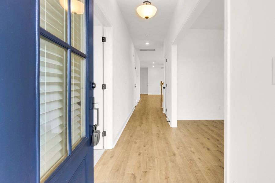 Representative unfurnished interior of a home built from the Titusville II by Regent Homes in Marlon's Creek, Spring Hill (Image 14).