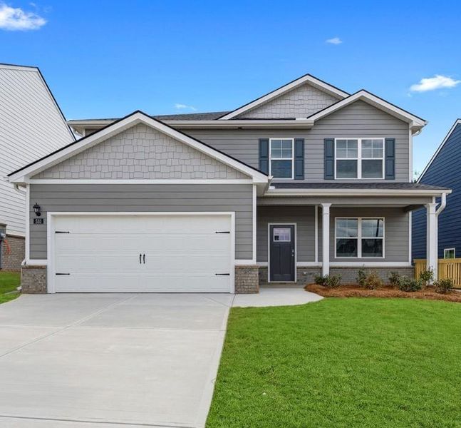 Front exterior of a new home in Twin Lakes, Hoschton, GA, highlighting curb appeal (Image 1). Front exterior of a new home in Twin Lakes, Hoschton, GA, highlighting curb appeal (Image 1).