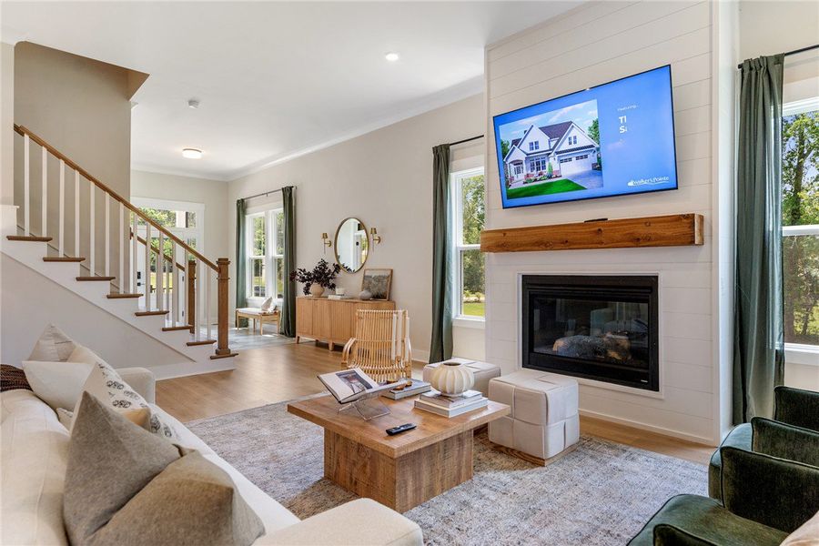 This inviting living space features an elegant fir