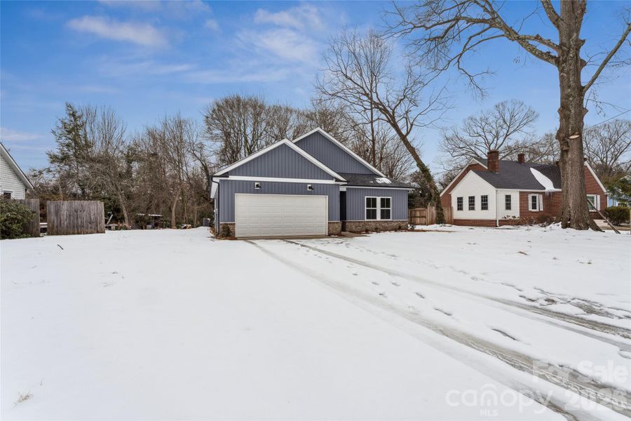 Front exterior of a new home in , Statesville, NC, highlighting curb appeal (Image 19).