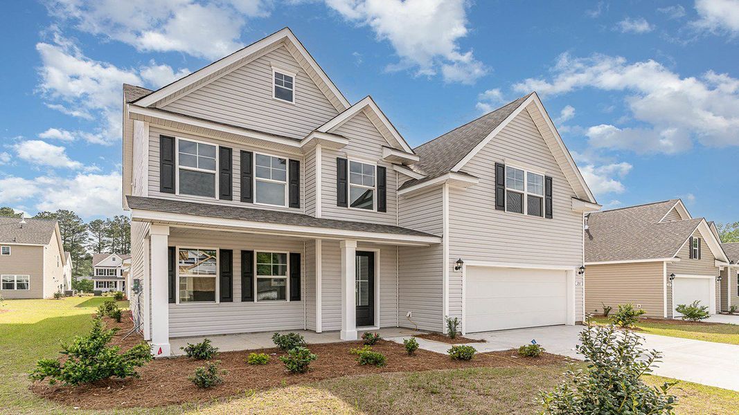 Representative exterior photo of a completed home built from the FORRESTER by D.R. Horton in Haven View, Murrells Inlet, SC (Image 17).