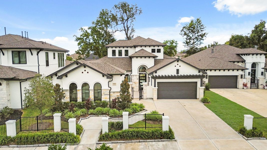 Front exterior of a new home in Sienna 55' - Valencia, Missouri City, TX, highlighting curb appeal (Image 1). Front exterior of a new home in Sienna 55' - Valencia, Missouri City, TX, highlighting curb appeal (Image 1).