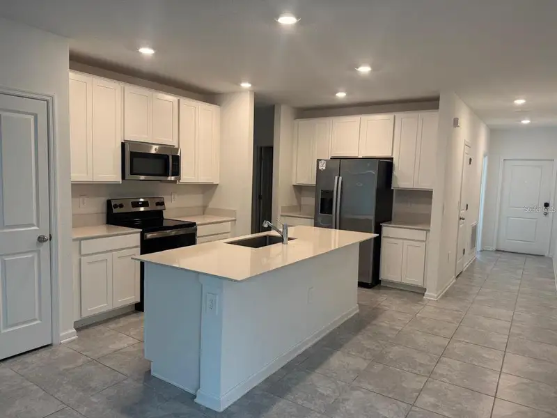 Furnished interior view inside a new home in Cascades, Davenport (Image 3).