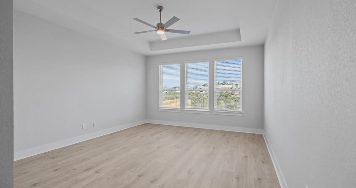 Representative unfurnished interior of a home built from the Raegan by Chesmar Homes in Sweetwater, Austin (Image 10).
