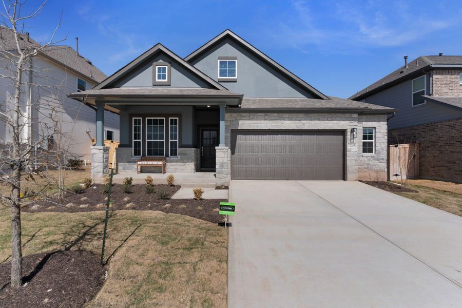 Front exterior of a new home in Nolina, Georgetown, TX, highlighting curb appeal (Image 2). Front exterior of a new home in Nolina, Georgetown, TX, highlighting curb appeal (Image 2).