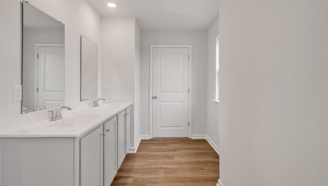 Representative unfurnished interior of a home built from the GLYNN by D.R. Horton in Grayson Park, Leland (Image 28).