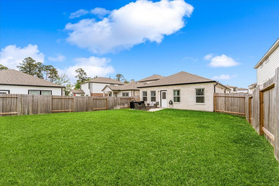 Exterior details and patio area of a home in , Magnolia (Image 3).