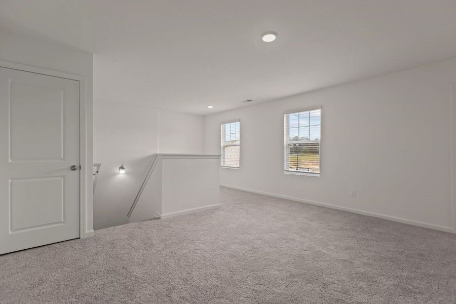 Representative unfurnished interior of a home built from the Hubble by Starlight Homes in Bayview, Conway (Image 19).