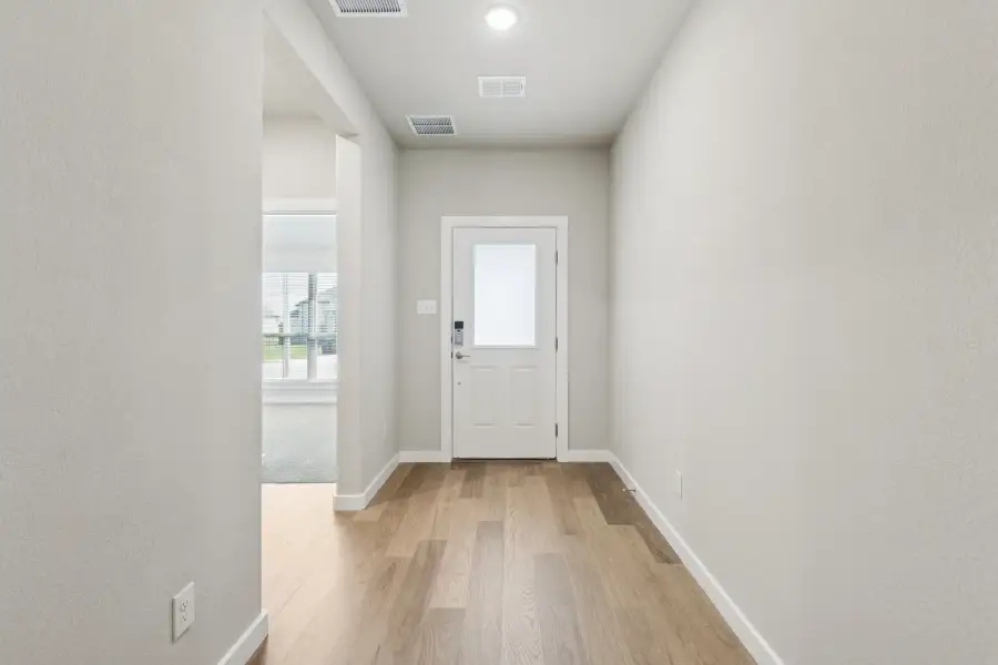 Entryway in the Heisman home plan by Trophy Signature Homes – REPRESENTATIVE PHOTO