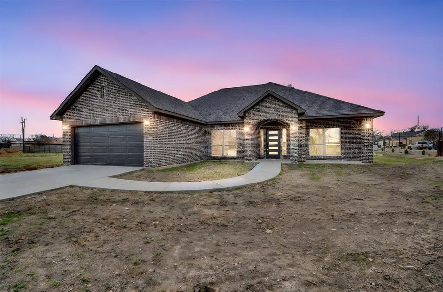 Front exterior of a new home in , Palmer, TX, highlighting curb appeal (Image 2). Front exterior of a new home in , Palmer, TX, highlighting curb appeal (Image 2).