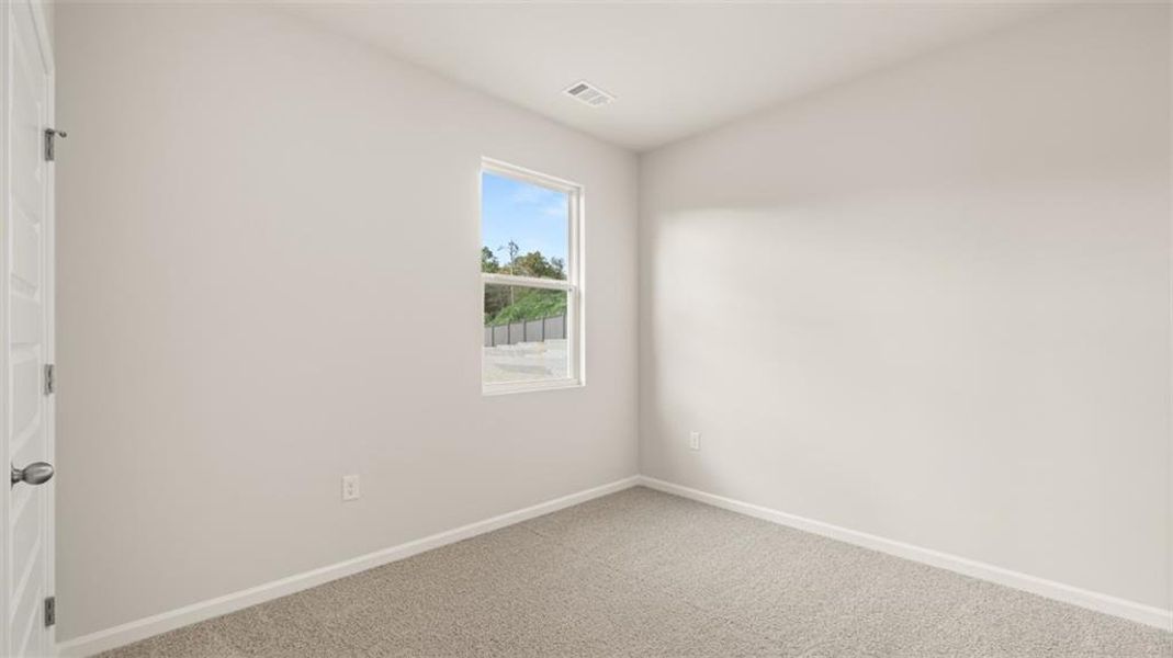 Spacious, unfurnished interior of a new home in Brooks Station, Dacula (Image 26).
