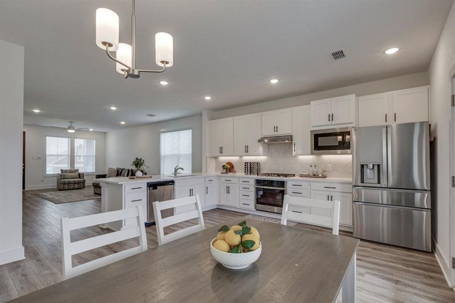 Furnished interior view inside a new home in Heritage Towne, Grand Prairie (Image 18).