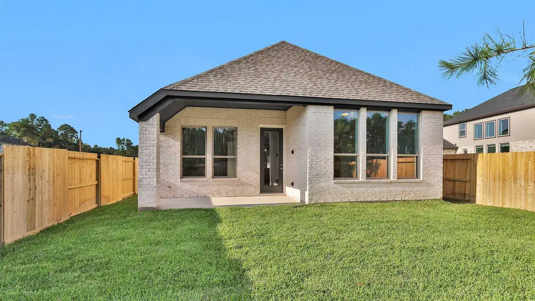Exterior details and patio area of a home in The Woodlands Hills 40', Willis (Image 2). Exterior details and patio area of a home in The Woodlands Hills 40', Willis (Image 2).