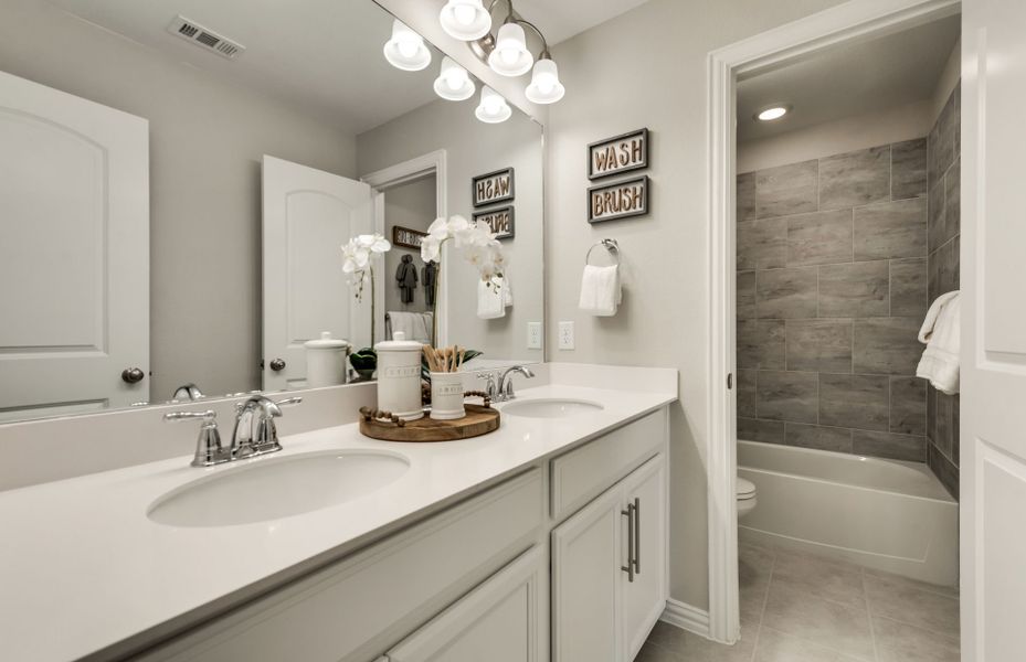 Secondary bathroom with optional double vanity and tile-surround shower