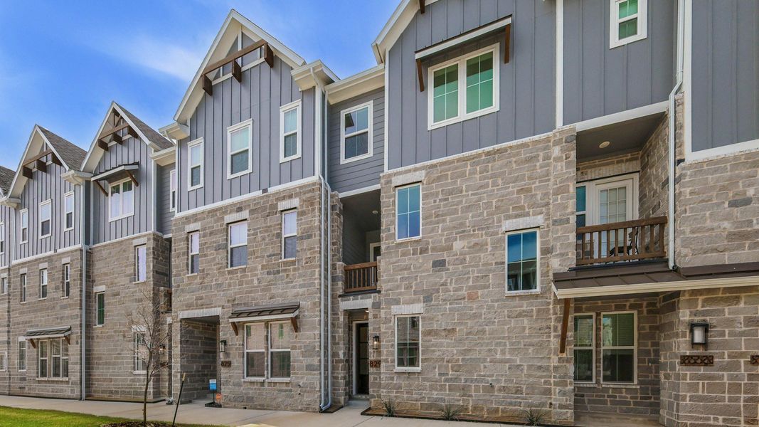 Furnished interior view inside a new home in Collin Creek, Plano (Image 6).