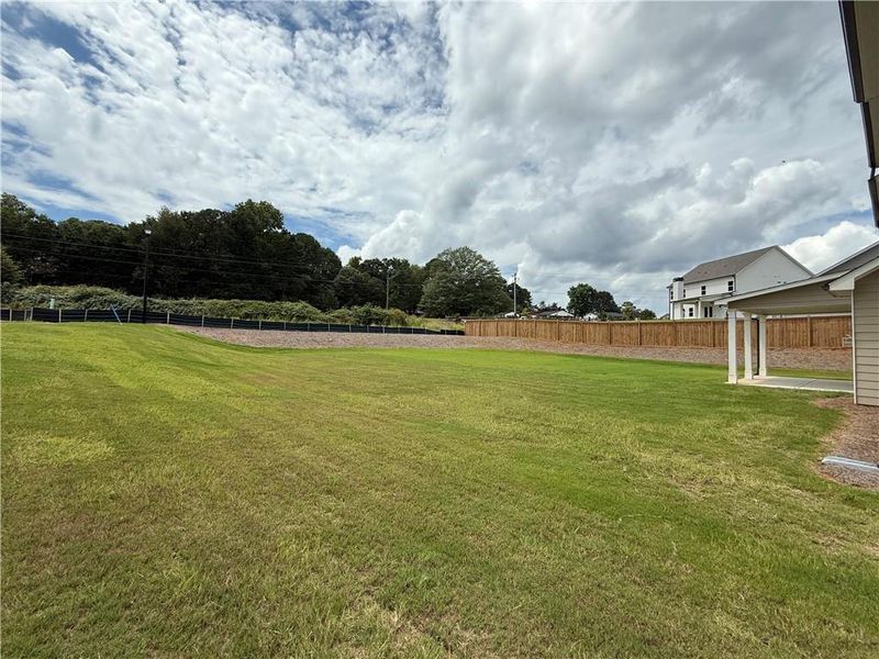 Exterior details and patio area of a home in Hidden Fields, Hoschton (Image 18). Exterior details and patio area of a home in Hidden Fields, Hoschton (Image 18).