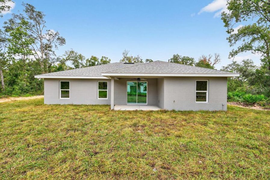 Exterior details and patio area of a home in , Ocklawaha (Image 22).