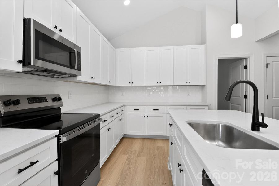Furnished interior view inside a new home in , Concord (Image 6).