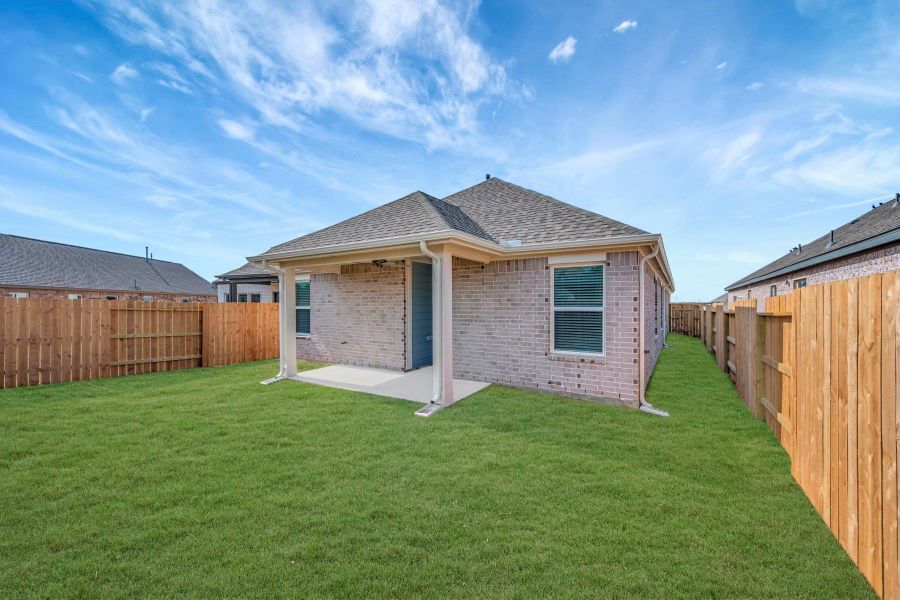 Exterior details and patio area of a home in Marvida, Cypress (Image 18).