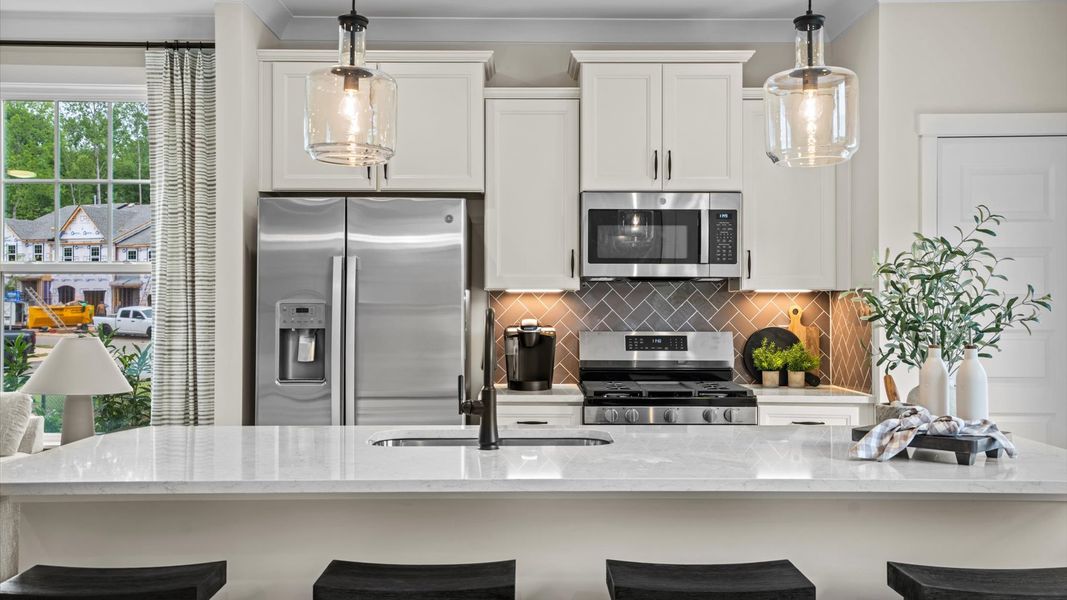 Representative furnished interior of a home built from the Litchfield by DRB Homes in North First Street Townes, Mebane (Image 14).