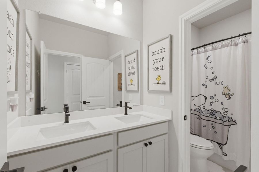 Furnished interior view inside a new home in Sunterra 45ft, Katy (Image 7).