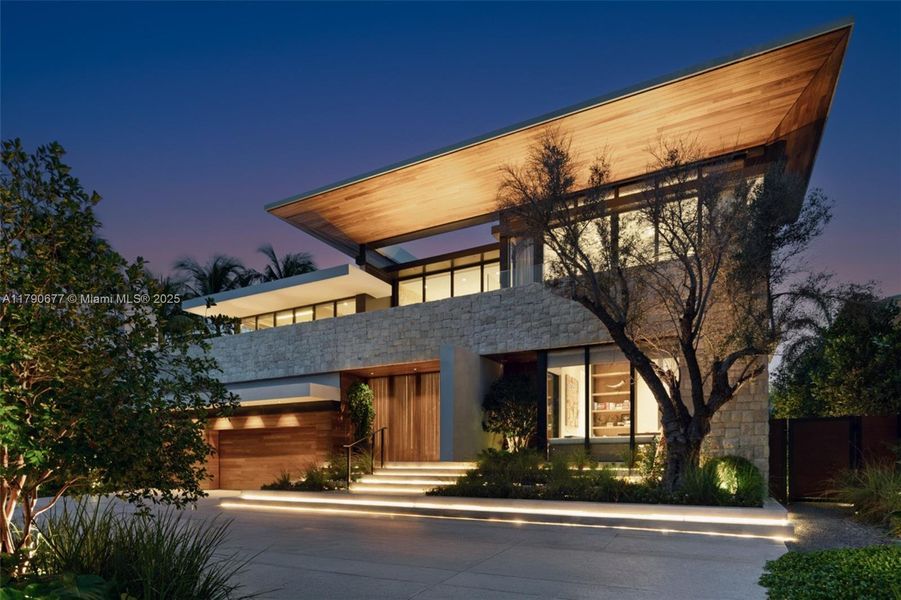 Front exterior of a new home in , Golden Beach, FL, highlighting curb appeal (Image 11).