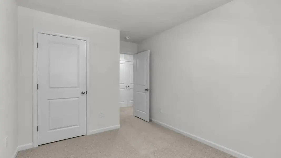 Spacious, unfurnished interior of a new home in The Townes at Prestleigh, Wake Forest (Image 20).