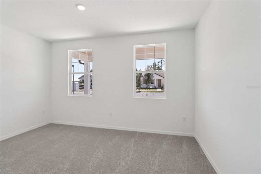 Spacious, unfurnished interior of a new home in Ardisia Park, New Smyrna Beach (Image 35).