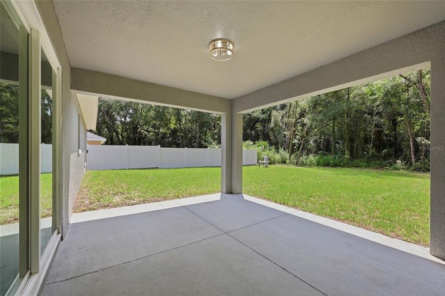 Exterior details and patio area of a home in , Summerfield (Image 4).