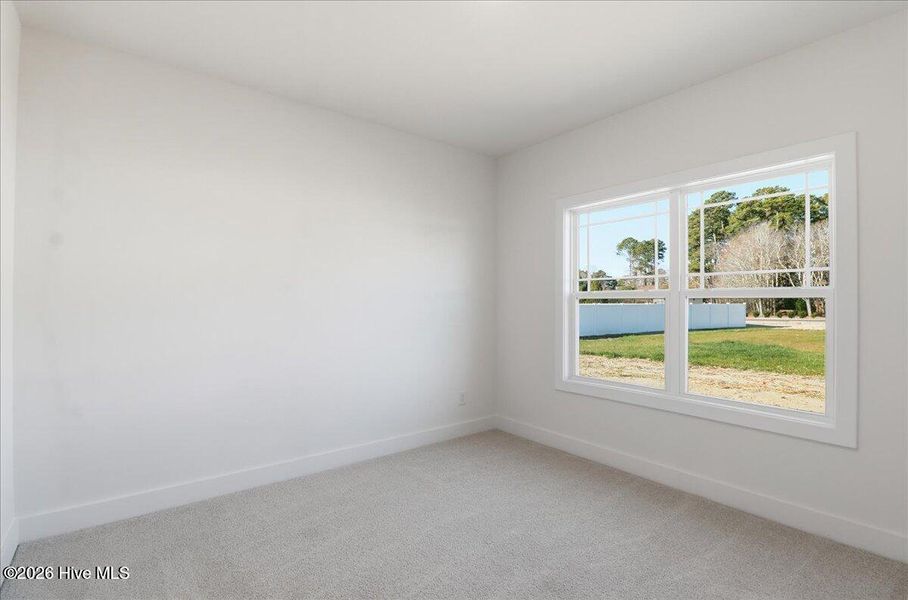 Spacious, unfurnished interior of a new home in Wood Creek, Leland (Image 19).