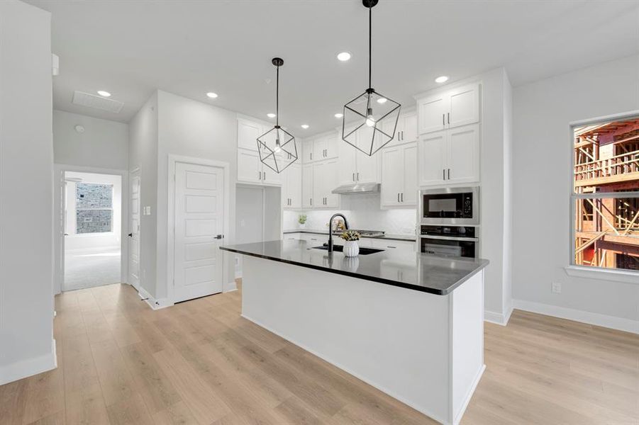 Furnished interior view inside a new home in Hillside at Las Colinas, Irving (Image 10). Furnished interior view inside a new home in Hillside at Las Colinas, Irving (Image 10).