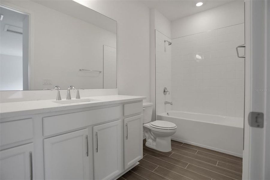 Furnished interior view inside a new home in Seaire, Parrish (Image 7).