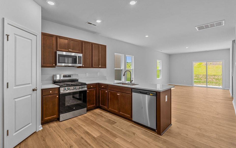 Furnished interior view inside a new home in Hanes Lake, Winston-Salem (Image 11). Furnished interior view inside a new home in Hanes Lake, Winston-Salem (Image 11).